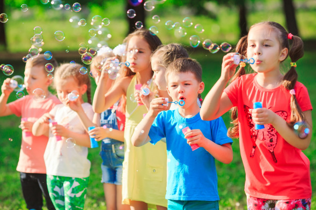 group-children-blowing-soap-bubbles_109285-4477.jpg